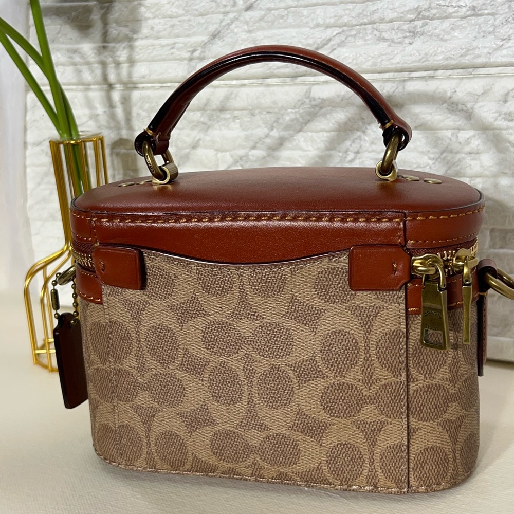 Coach Vanity bag. Only worn once. Comes with strap.